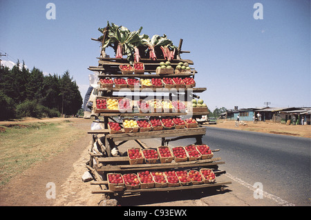 Rhubarb Plums and Oranges on Sale at Side of Nairobi Limuru Road Kenya in roadside stall Stock Photo