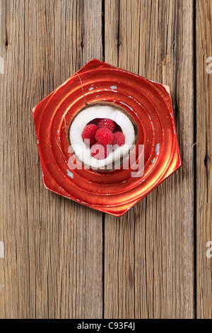 Fresh raspberries in a coconut shell Stock Photo - Alamy
