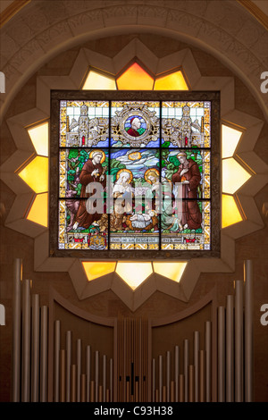 The stained glass window behind the altar at St. Catherine church, Bethlehem Stock Photo