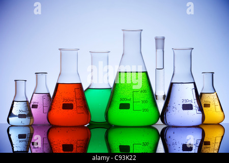 group of laboratory flasks with colored liquid inside Stock Photo