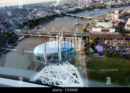 London city from birds view as seen from London Eye or Millennium Wheel cabin on June 10, 2011, Londun, UK. Stock Photo