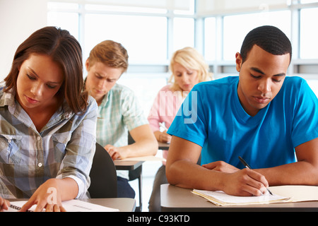 Students working in classroom Stock Photo