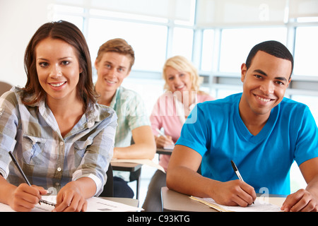 Students working in classroom Stock Photo