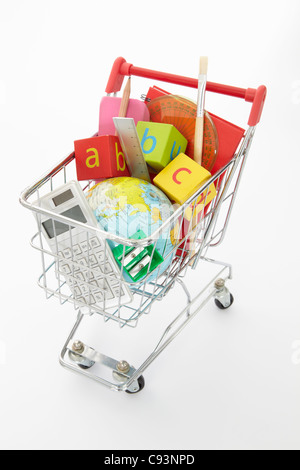Trolley full of items for school Stock Photo