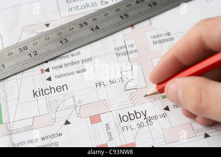 Man working on technical drawing Stock Photo