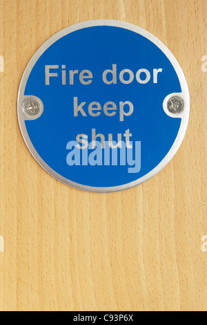 Keep shut sign on fire door Stock Photo