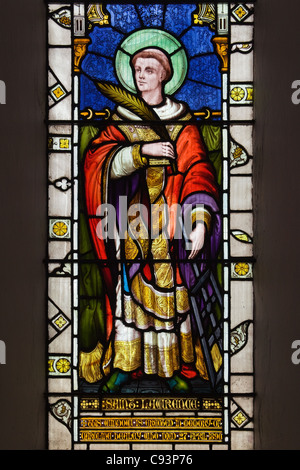 Stained glass window showing St. Lawrence in St. Lawrence's Church in Scunthorpe, North Lincolnshire