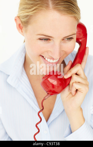 Woman talking on telephone Stock Photo