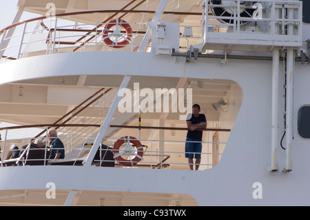 Passenger on stern deck of MSC Armonia cruise ship Stock Photo