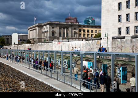The outdoor Topography of Terror Museum on site of the former Nazi Gestapo HQ in Berlin, Germany. Part of Berlin Wall is behind. Stock Photo