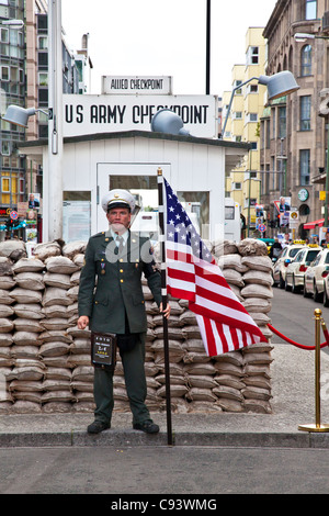 Checkpoint Charlie, the famous Berlin Wall crossing between East and West Berlin, now a tourist sightseeing attraction. Stock Photo