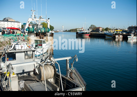 Fishing trawlers moored at the quay of the outer port, the harbour bassin of commercial fishermen in Honfleur, Normandy, France Stock Photo