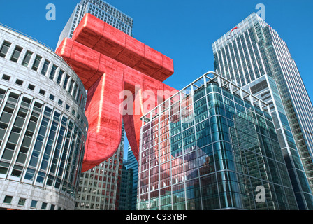 Digitally altered Photograph by hitandrun media. A Giant Renminbi Yuan symbol, floating between buildings in Canary Wharf, Londo Stock Photo