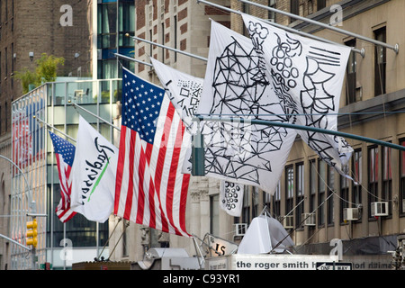 American flags flying on the skyscrapers in the Manhattan neighborhood ...