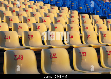 Row of yellow chairs Stock Photo