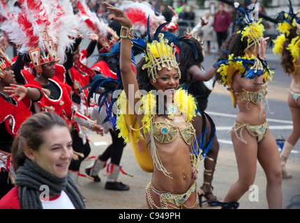 London, UK, 12.11.2011 Carnival-style dancers outside Mansion House participating in the annual Lord Mayor's Show 2011 procession from the City of London to the Royal Courts of Justice. Photo:Jeff Gilbert Stock Photo