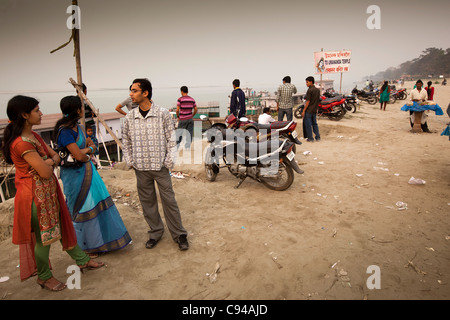 India, Assam, Guwahati, Brahmaputra Riverbank, early evening, people at at jetty for boat to Umanada Temple Stock Photo