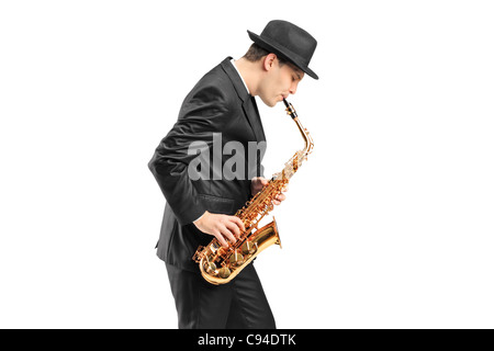 A young man playing on saxophone Stock Photo