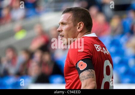 Craig Bellamy of Wales with Poppy armband during the Wales v Norway Vauxhall international friendly match at the Cardiff City Stadium in South Wales. Editorial use only. Stock Photo