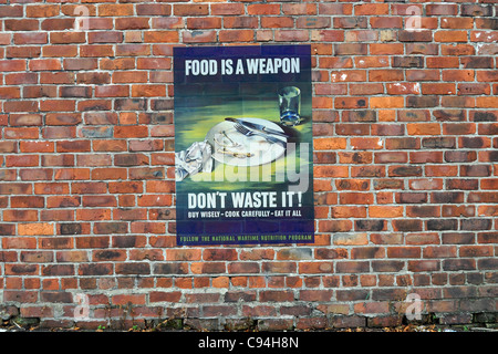 American WW2 Propaganda Poster on a brick wall Stock Photo