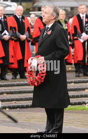 Peter Robinson, First Minister for Northern Ireland, lays a wreath during the Remembrance Sunday wreath laying ceremony, Belfast 13/11/2011 Stock Photo