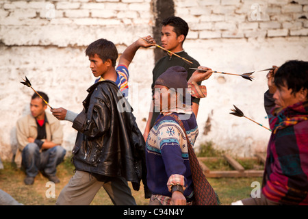 India, Meghalaya, Shillong, Bola archery, archers throwing darts ifor target practice between competitions Stock Photo