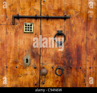 Aged old golden wood door from Ibiza downtown Stock Photo