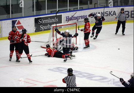 USA celebrating their third goal, by #16 Kelli Stack. The final between Canada and USA ended 3-4 (after shootout) in the tournament in Nyköping, Sweden Stock Photo