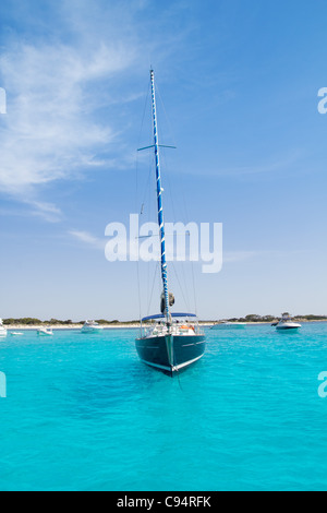 Luxury sailboat in turquoise beach of Formentera Illetes Stock Photo