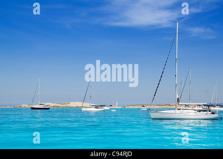 Luxury sailboats in turquoise beach of Formentera Illetes Stock Photo