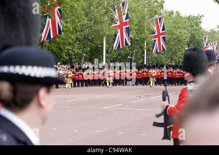 Foot Guards bands with Drum Majors marching towards Buckingham Palace, London, United kingdom. Stock Photo