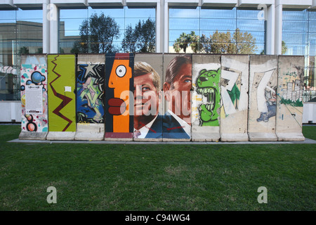 JFK & RONALD REAGAN PORTAITS & GRAFFITI BEHIND THE BERLIN WALL. PRESENTED BY THE WENDE MUSEUM LOS ANGELES CALIFORNIA USA 13 No Stock Photo