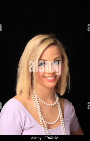Portrait of an attractive eighteen year old blond woman Stock Photo - Alamy