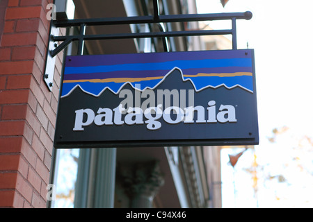 A Patagonia sign hangs outside of a retail store on Pearl Street in Boulder, Colorado Stock Photo