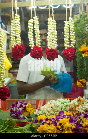 flower garlands are being sold in little india in Singapore, in the month of Dewali Stock Photo