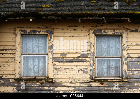 Windows with curtains in a wooden house in Saint George island, Pribilof Islands, Alaska, USA Stock Photo