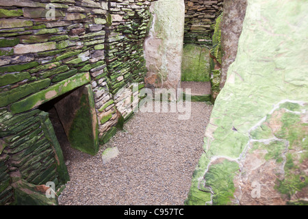 Unstan Chambered Cairn is a stone age burial mound near Stenness on Orkney's Mainland. Stock Photo