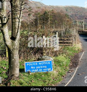 Police No Parking Sign on the Roadside near Old Dungeon Ghyll Hotel Langdale Valley Lake District Cumbria England UK Stock Photo