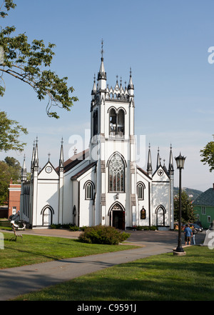 Lunenburg Carpenter Gothic Anglican Church front facade. The front entrance and tower of Lunenburg's venerable wooden Church Stock Photo