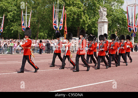 Foot Guards marching in front of Buckingham Palace during Trooping the Colour, London. Stock Photo