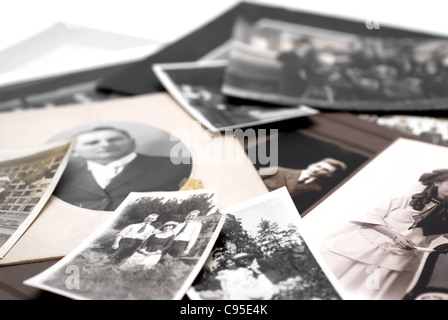 Closeup of a pile of vintage family photos Stock Photo