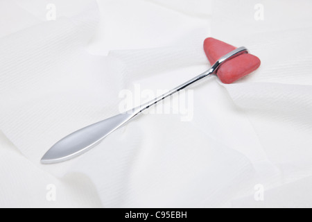 Reflex hammer on white background, studio shot Stock Photo