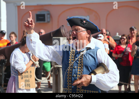A woman is sentenced to the 'The Dunking Stool', as a 'nag and gossip ' in an historical reenactment   in St. Georges, Bermuda Stock Photo
