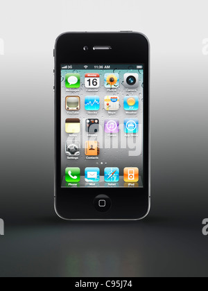 Apple iPhone 4 smartphone with desktop icons on its display isolated on gray background Stock Photo