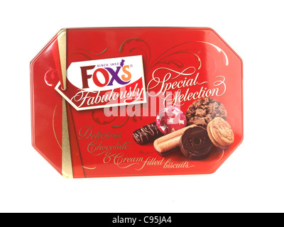 Red Tin Of Branded Fox's Biscuits Selection Isolated Against A White Background With A Clipping Path And No People Stock Photo