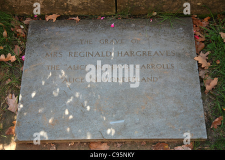 The grave of Mrs Reginald Hargreaves, the 'Alice' in Lewis Carroll's 'Alice in Wonderland', in a graveyard overlooking Lyndhurst Stock Photo