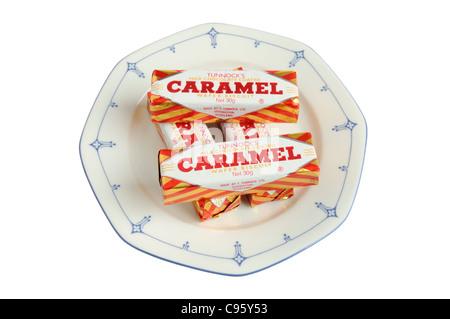 Tunnock's caramel wafer biscuits on a plate Stock Photo