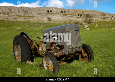 Disused Old Grey Ferguson Tractor on Farm, near Ingleton, Yorkshire, Dales Landscape, UK Stock Photo