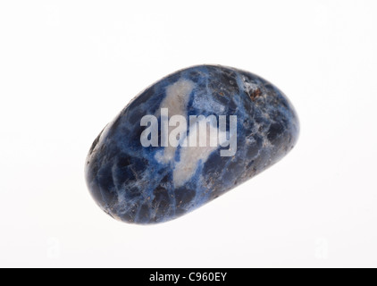 Cutout of a sodalite gemstone on white background Stock Photo