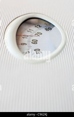 Weight measurement, close-up. Stock Photo